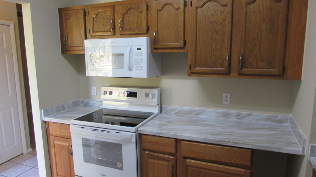 Photo of 3067 SW Circle Street, Port Saint Lucie, FL 34953 (MLS # R11046044)