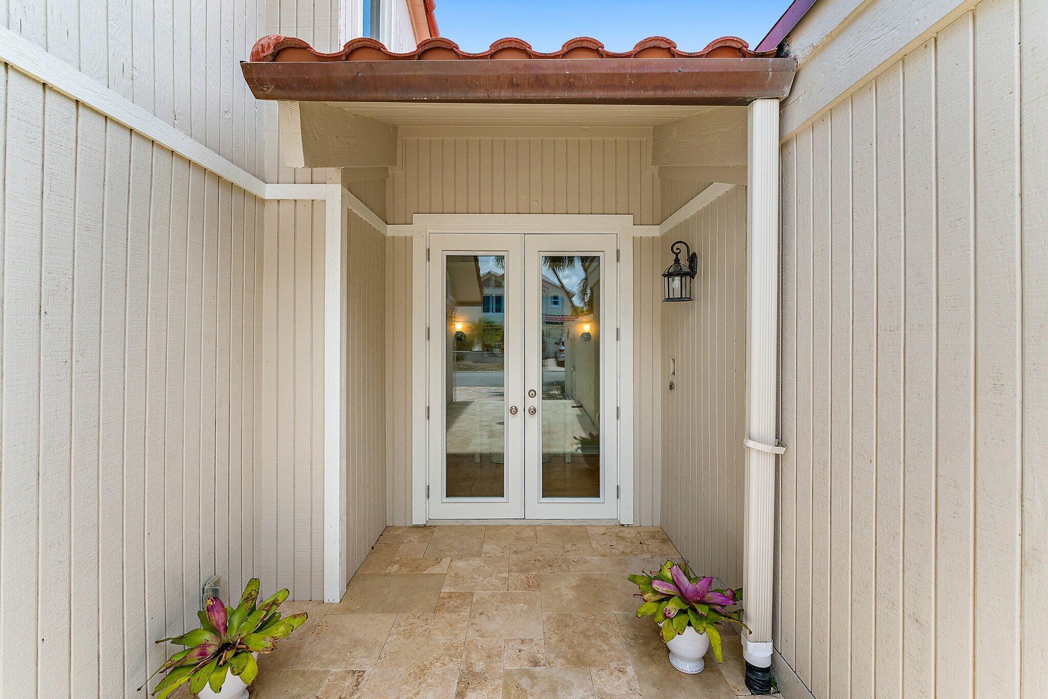 Coastal living in Jupiter - welcome to your fully furnished retreat steps from the Atlantic! This charming 3 br/3 ba home is located in the sough-after community of Ocean Walk. Relax by the private heated pool surrounded by tropical landscaping or take a short stroll to the dog-friendly beaches of Jupiter. This home features impact windows, a new roof and 2 car garage. Available for ANNUAL or SEASONAL; pets are considered on a case-by-case basis.
