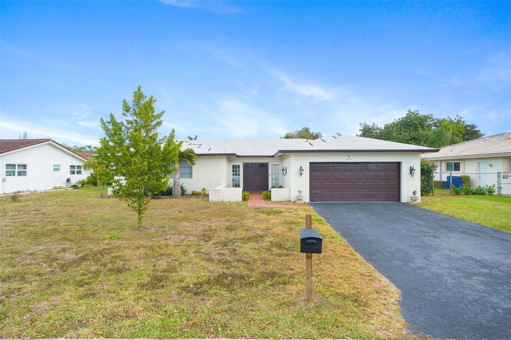 Photo of 4221 NW 107th Avenue, Coral Springs, FL 33065 (MLS # F10550899)