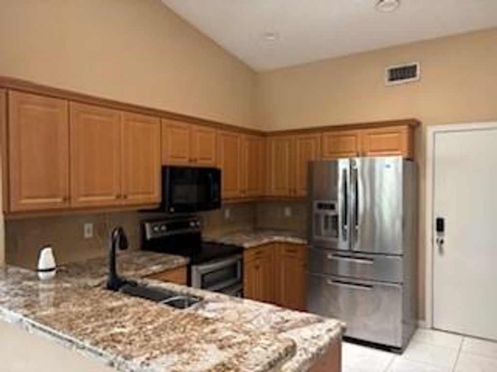 Photo of 9593 Harbour Lake Cir, Boynton Beach, FL 33437 (MLS # F10533599)