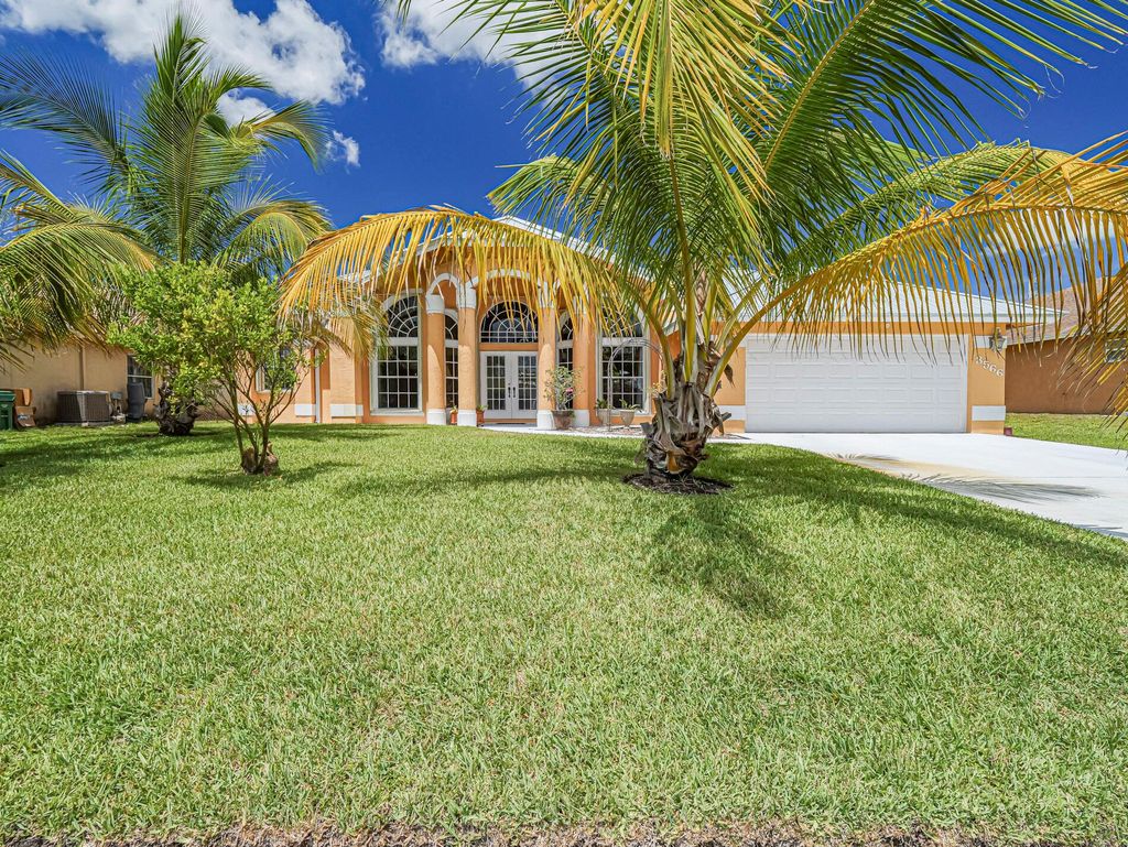 Photo of 3566 SW Voyager Street, Port Saint Lucie, FL 34953 (MLS # R11114456)