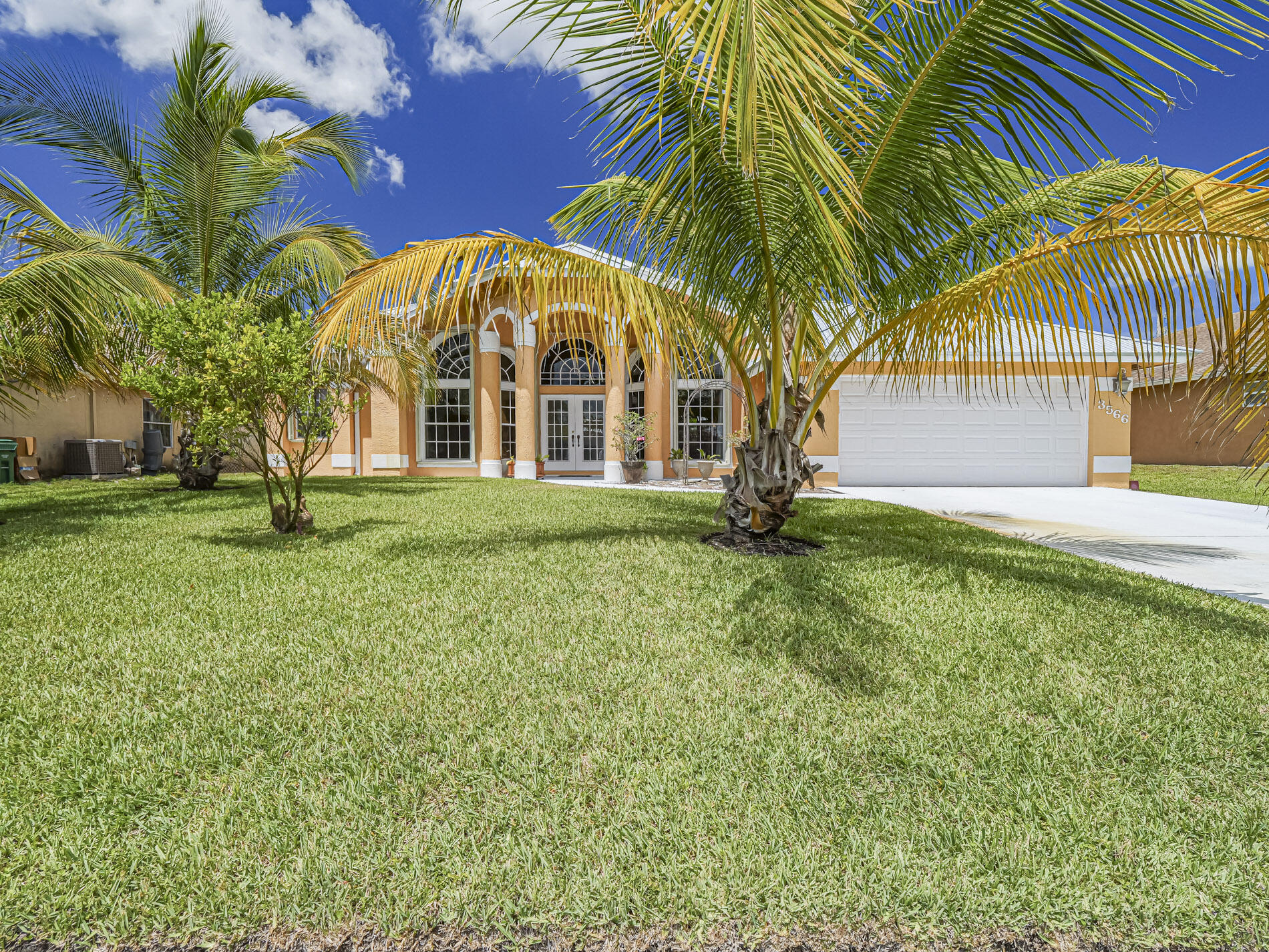 :Welcome to this spacious and move in ready home nestled in a great neighborhood. Set on a large, fully fenced lot adorned w fruit trees, this property offers the perfect blend of indoor comfort & outdoor living. Features include: Renovated kitchen with granite & stainless steel, tasteful tile flooring throughout & a split bedroom plan for added privacy. Relax in the screened lanai, perfect for Florida evenings. A brand new metal roof and accordion hurricane shutters offer added protection & peace of mind. Large fenced yard with space to play, garden or entertain. Located close to schools, shopping, dining and highways. ROOF 2024, AC 2018.