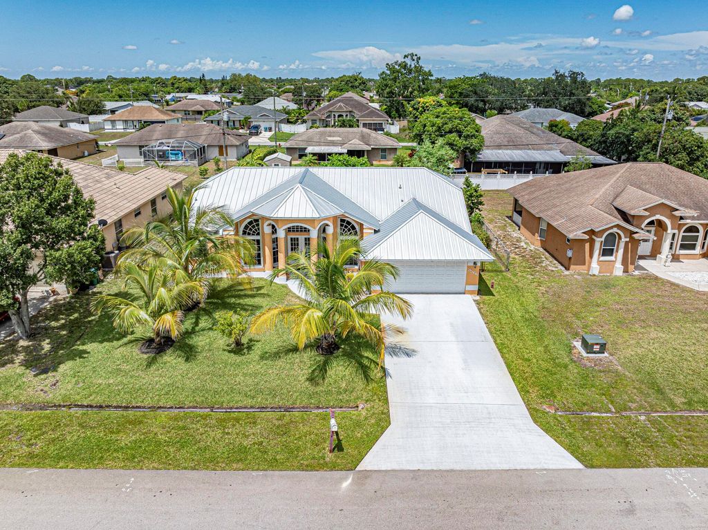 Photo of 3566 SW Voyager Street, Port Saint Lucie, FL 34953 (MLS # R11114456)