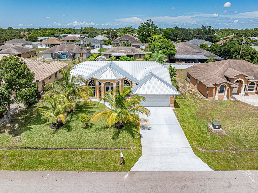 Photo of 3566 SW Voyager Street, Port Saint Lucie, FL 34953 (MLS # R11114456)