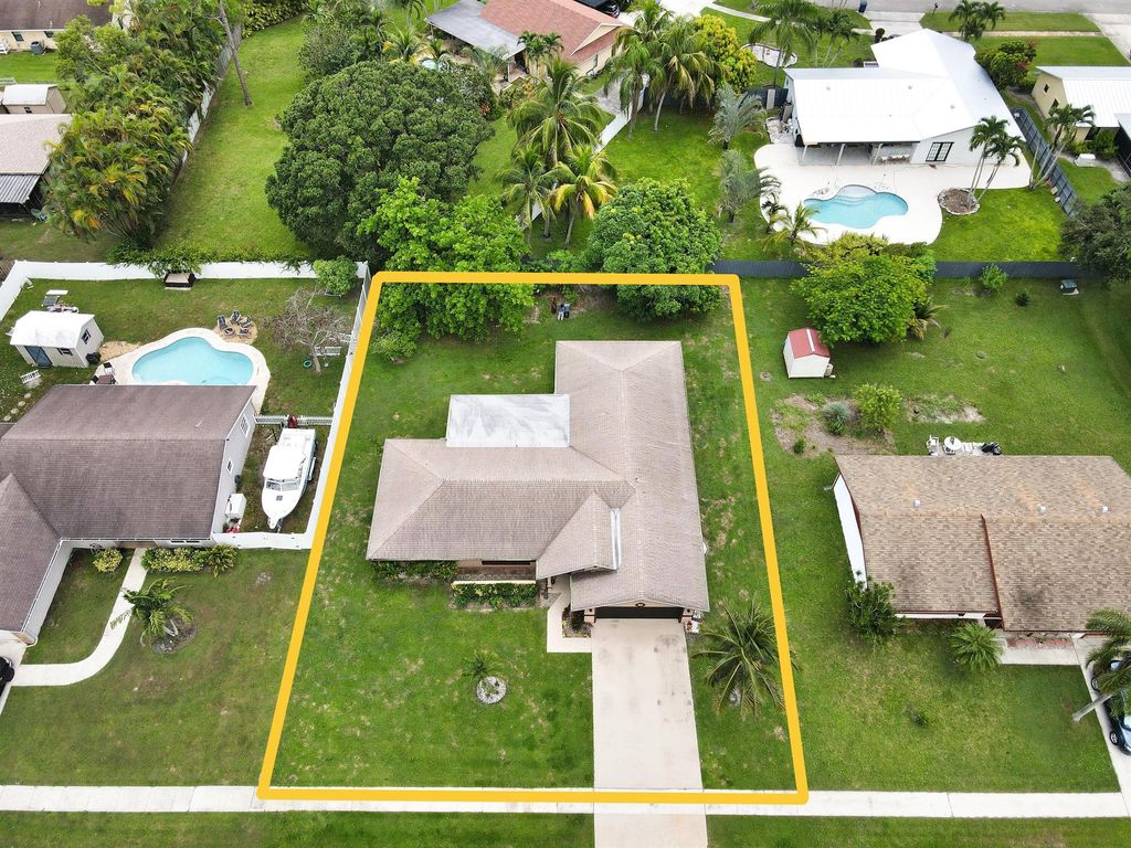 Photo of 145 Santa Monica Avenue, Royal Palm Beach, FL 33411 (MLS # R11117770)