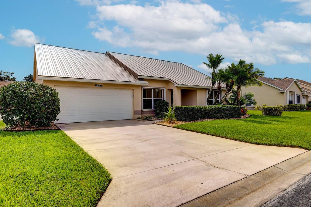 Photo of 1042 NW Tuscany Drive, Port St Lucie, FL 34986 (MLS # R10921236)