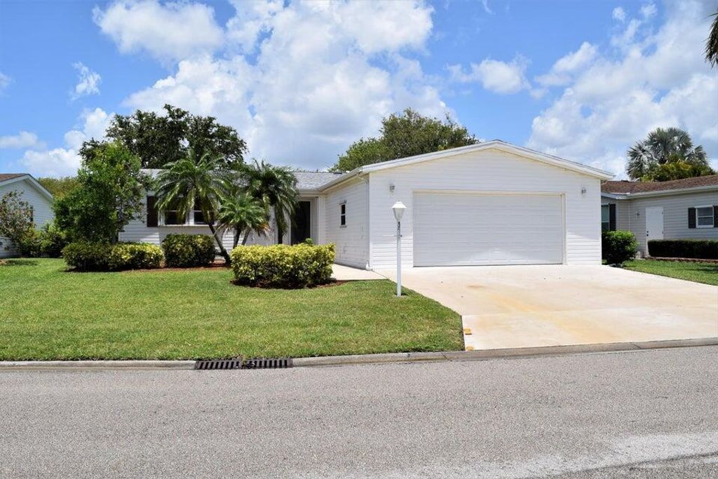 Photo of 3413 Crabapple Drive, Port Saint Lucie, FL 34952 (MLS # R10980998)