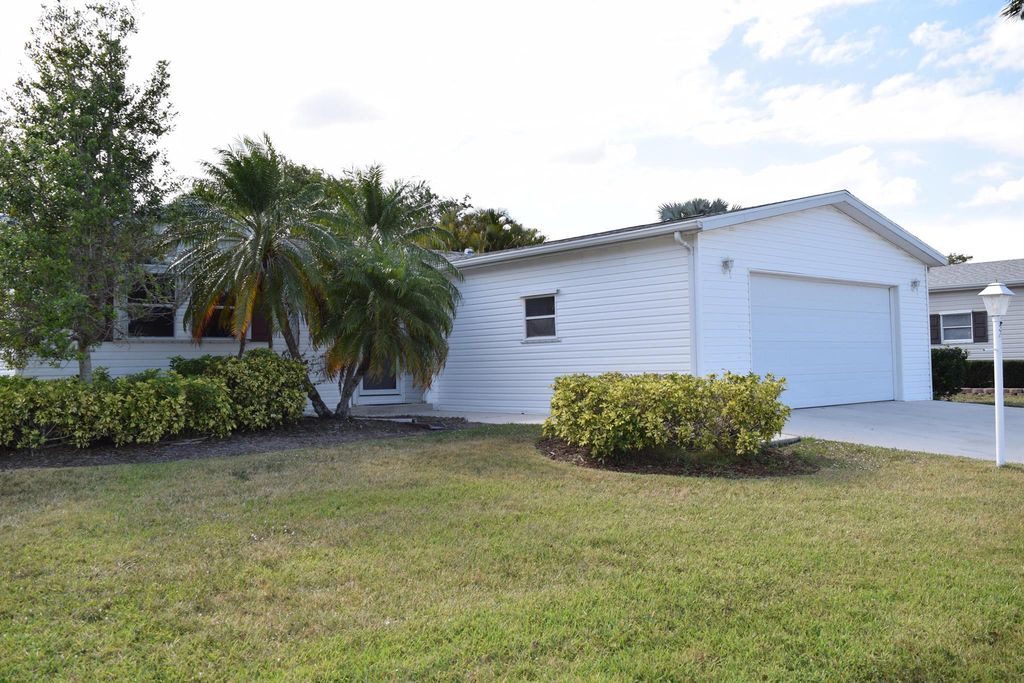 Photo of 3413 Crabapple Drive, Port Saint Lucie, FL 34952 (MLS # R10980998)