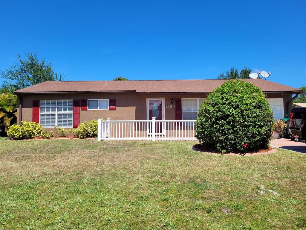 Photo of 2267 SE Trillo Street, Port Saint Lucie, FL 34952 (MLS # R10703319)