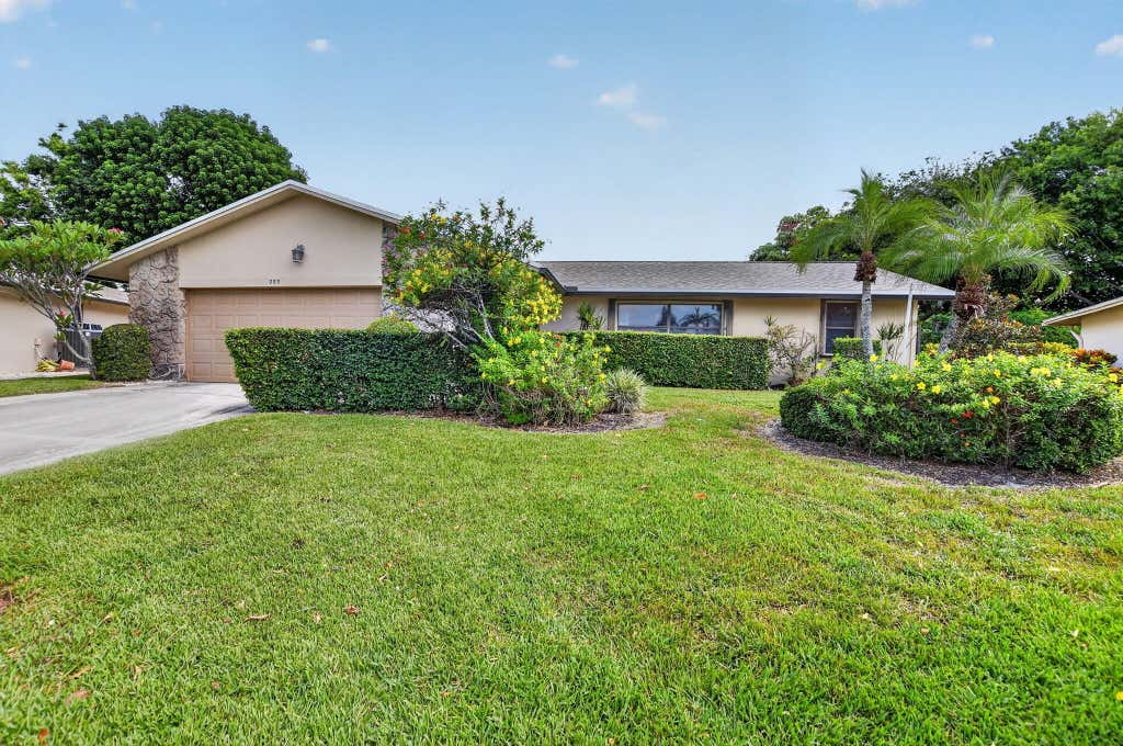 Photo of 999 NW 23RD Lane, Delray Beach, FL 33445 (MLS # B26060975)