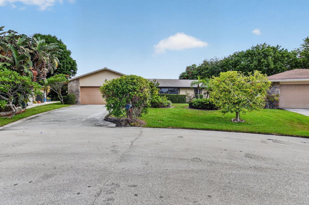Photo of 999 NW 23RD Lane, Delray Beach, FL 33445 (MLS # B26060975)