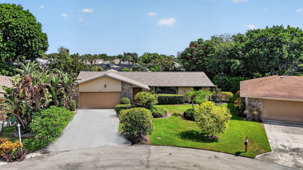 Photo of 999 NW 23RD Lane, Delray Beach, FL 33445 (MLS # B26060975)