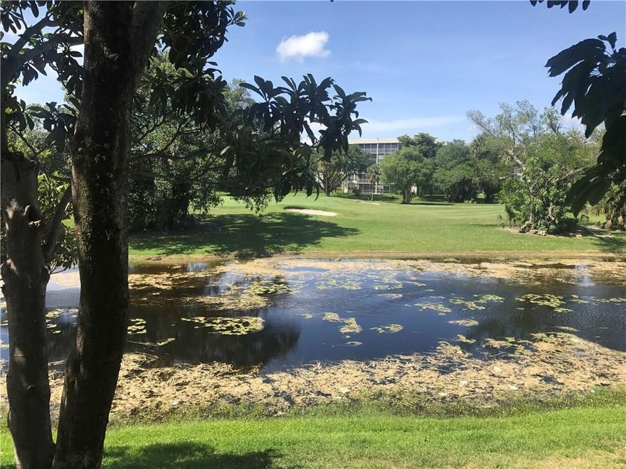 Gorgeous Lake and Golf course View in gated neighborhood. Updated kitchen, tile flooring throughout, balcony, washer and dryer in the unit, and walk in master closet.  Community pool, gym, and tennis courts. Available June 16. This will not last.