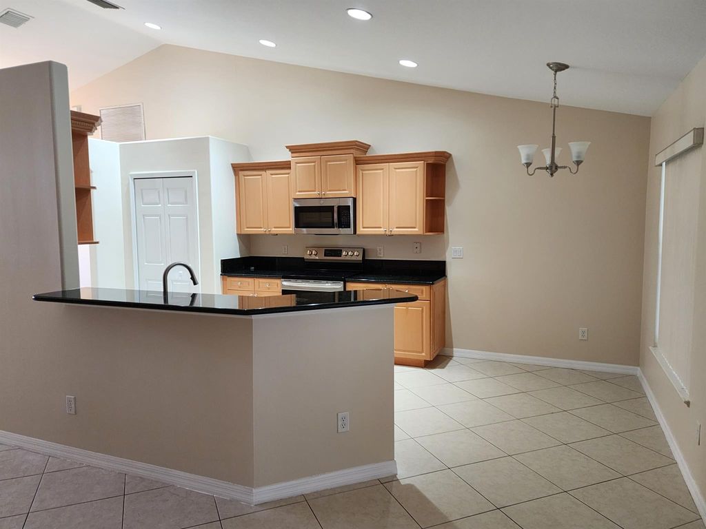 Photo of 3525 SW San Giorgio Street, Port Saint Lucie, FL 34953 (MLS # R11000516)