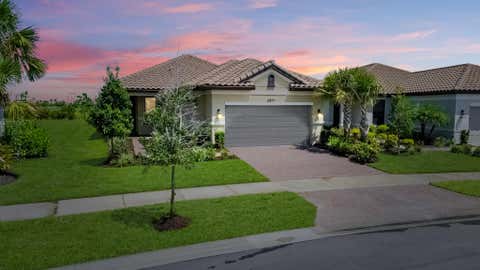 Photo of 12877 SW Ambra Street, Port Saint Lucie, FL 34987 (MLS # B26061381)