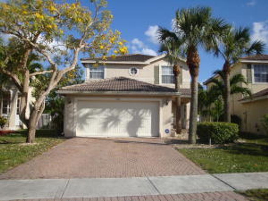 Great home with large screened patio & fence backyard.  2nd Floor has accordion shutters.  All tiled floors & good condition.  Gated community within walking distance to Elementary & Middle schools.