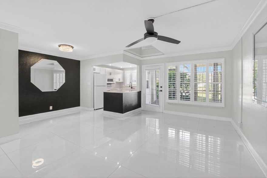 Welcome to easy living in this renovated 1 bedroom, 1.5 bath condo located in a vibrant 55+ community in EAST DEERFIELD BEACH! This unit features an open-concept living and dining area, bright kitchen with island and ample cabinet space, and large primary suite with en-suite and walk in closet. Enjoy peaceful mornings on your screened in balcony, perfect for relaxing and  overlooking pool area~ additional half bath adds extra convenience for guests. Community amenities include Clubhouse, Pool, Shuffleboard and Social Activities~ everything you need to live your best life whether you're looking for seasonal getaway or full time residence, this move in ready condo offers comfort, community and convenience. Schedule your showing today!