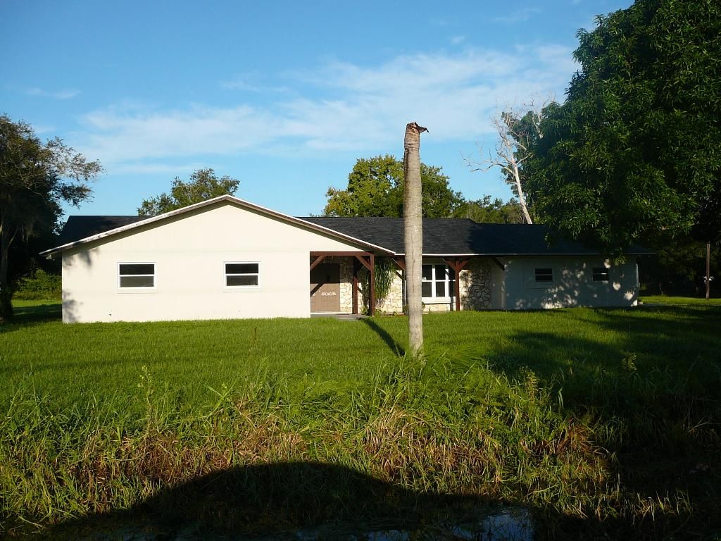 Photo of 2771 Coolidge Road, Fort Pierce, FL 34945 (MLS # R11026062)