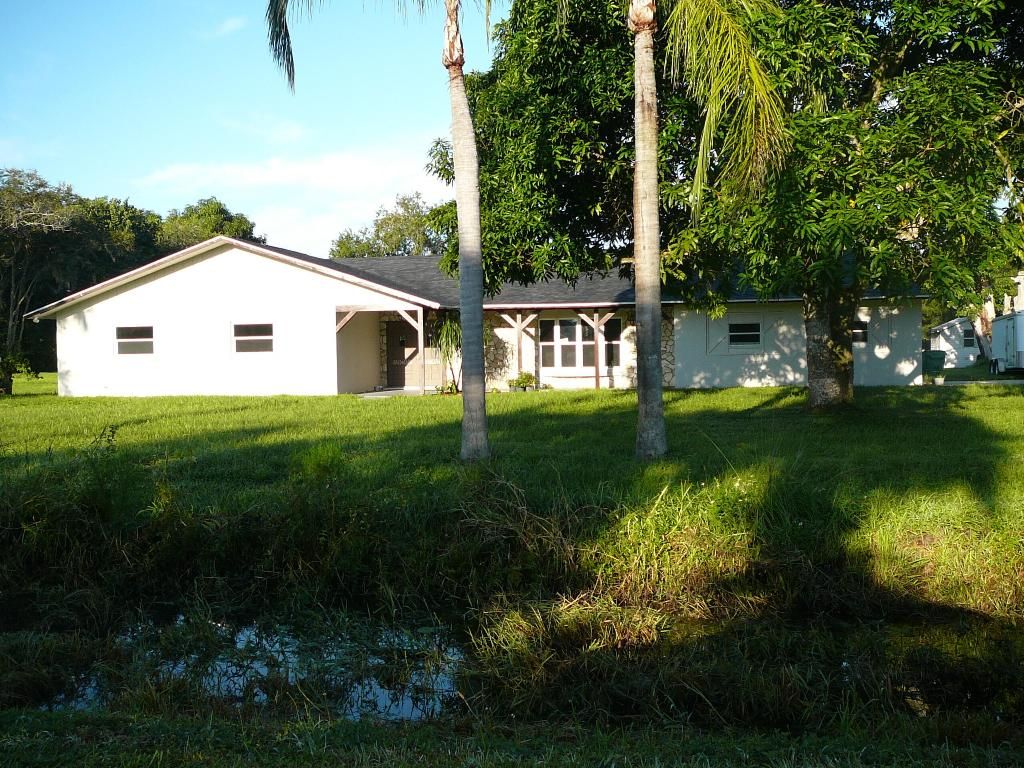 Photo of 2771 Coolidge Road, Fort Pierce, FL 34945 (MLS # R11026062)