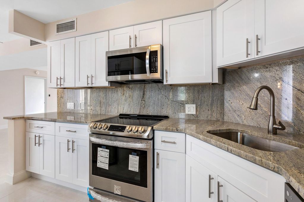 Photo of 130 Lakeshore Drive #323, North Palm Beach, FL 33408 (MLS # R11136077)