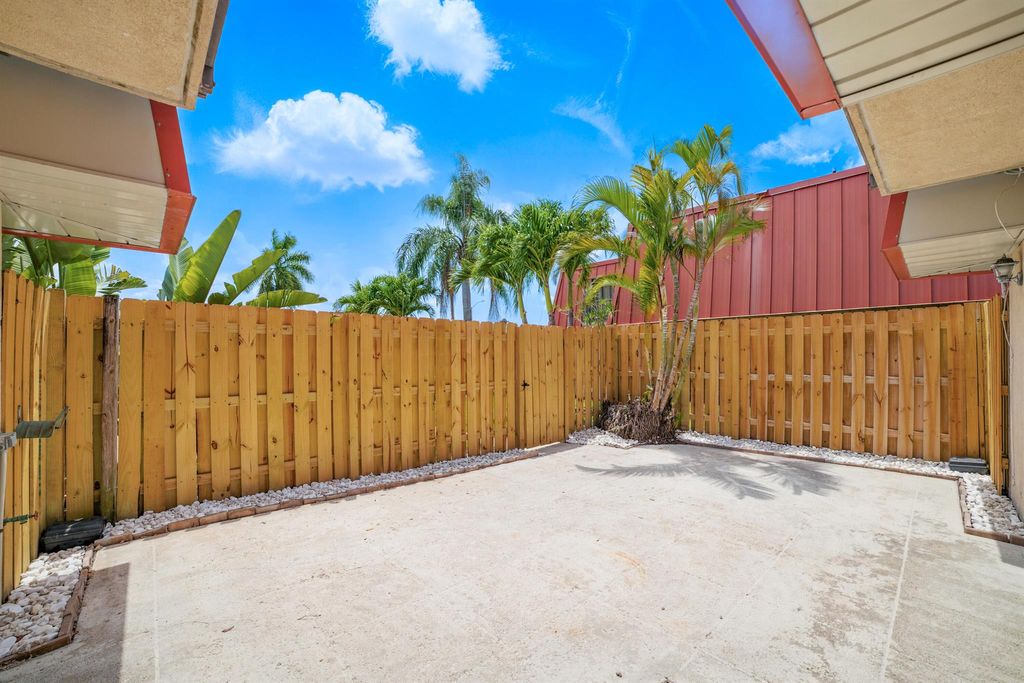 Photo of 3211 S Meridian Way S #A, Palm Beach Gardens, FL 33410 (MLS # R11090477)