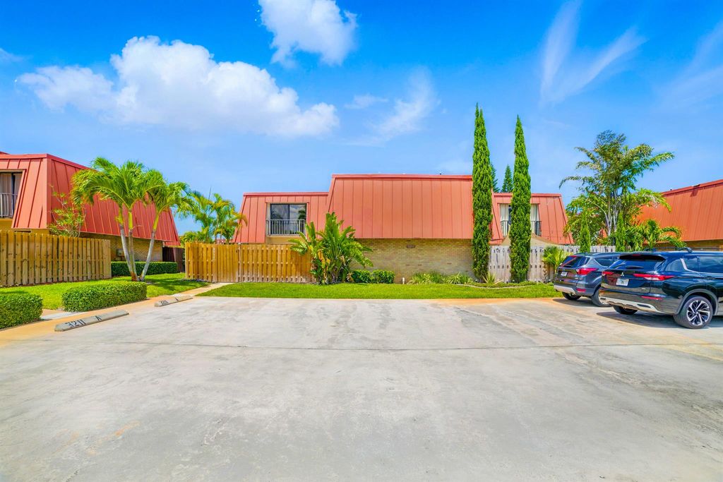 Photo of 3211 S Meridian Way S #A, Palm Beach Gardens, FL 33410 (MLS # R11090477)