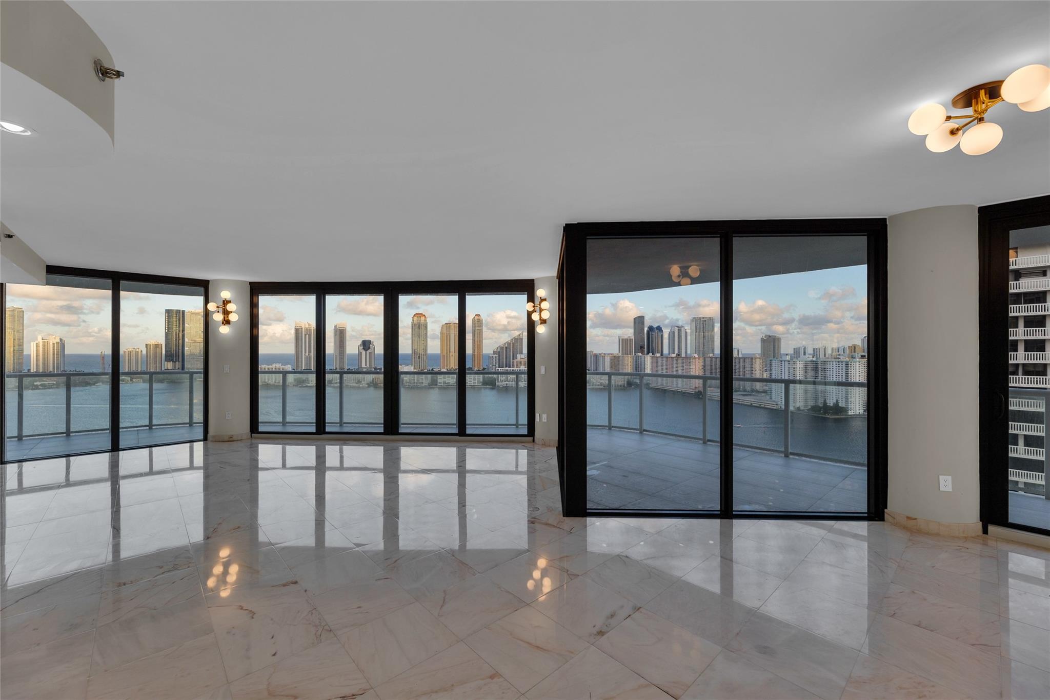 Experience breathtaking views of the Intracoastal and ocean from every room. This spacious condo boasts an open-concept kitchen & new floor-to-ceiling hurricane impact windows. For a distinctive opportunity, the neighboring unit 2606 is also available for purchase, offering the potential to merge both into a generously sized residence (over 4,000 sq ft) with minimal effort.
Indulge in luxury resort living on Williams Island. Featuring a 27,000 sqft spa with an indoor pool, tennis & pickleball courts, dog park, playground, restaurants, an outdoor pool with food and drink service, marina, walkways along the Intracoastal & gated security. 4000 Building is undergoing a $32M renovation! The upgrades include a new pool deck, lobby, entrance, hallways, elevators, glass balconies, and more.