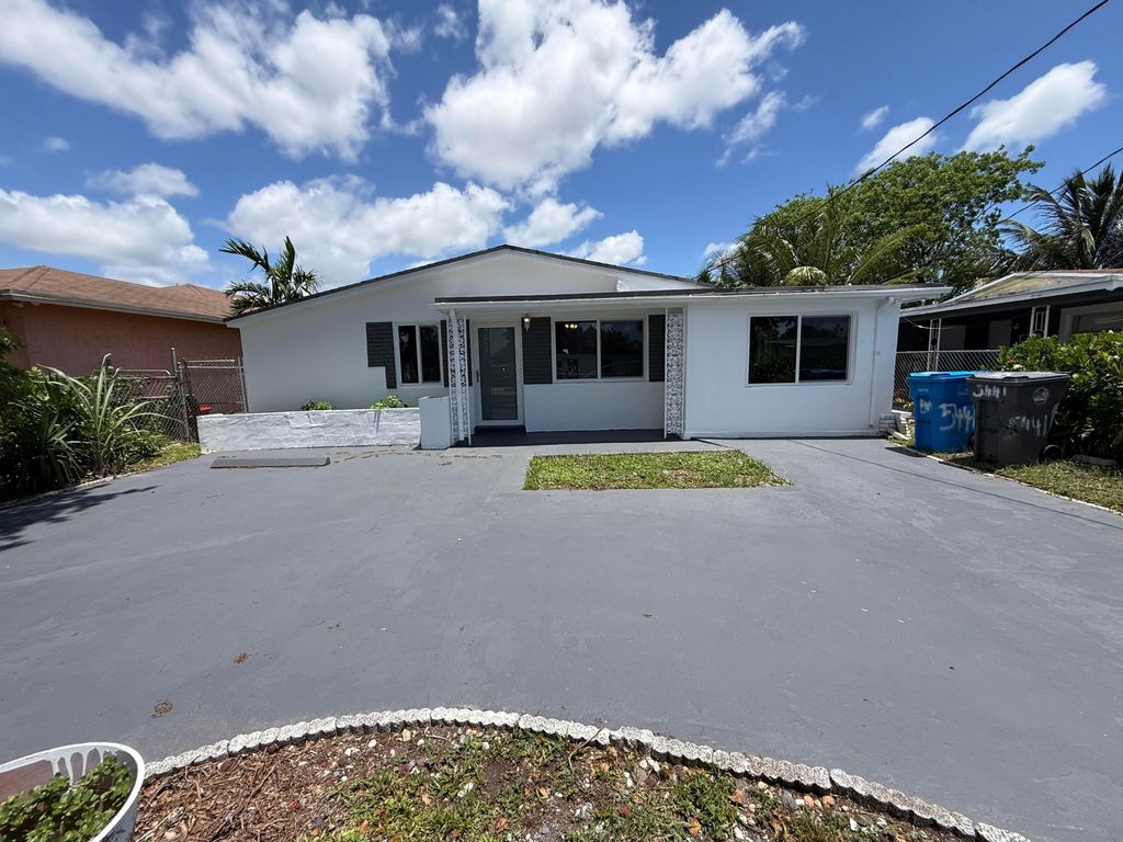 Photo of 5441 SW 18th Street, West Park, FL 33023 (MLS # B26049359)