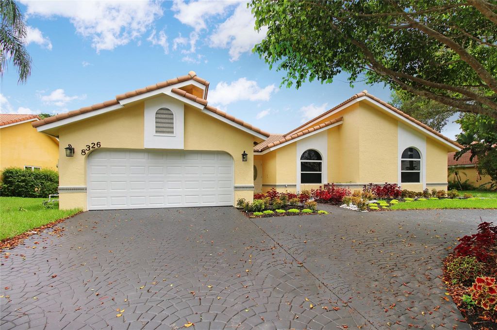 Photo of 8326 NW 52nd Pl, Coral Springs, FL 33067 (MLS # F10390217)