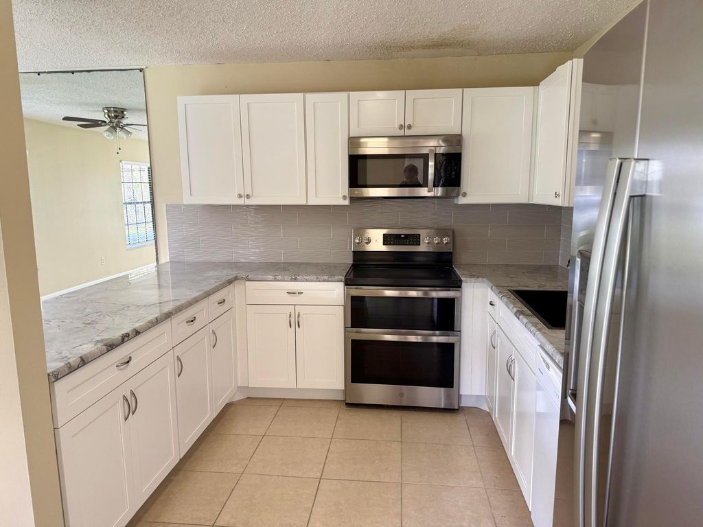 Photo of 1611 Laurel Leaf Lane #B, Fort Pierce, FL 34950 (MLS # B26008644)