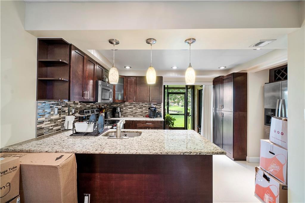 WIMBLEDON AT JACARANDA - Residential