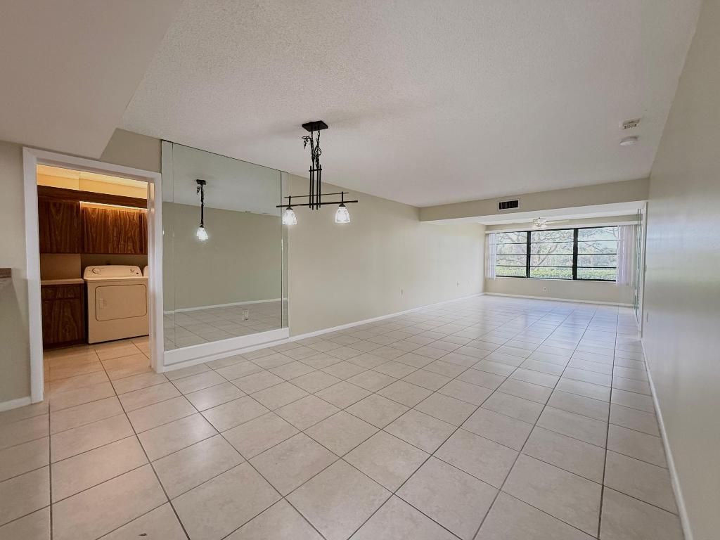 Photo of 3515 Village Boulevard #202, West Palm Beach, FL 33409 (MLS # R11144027)