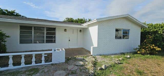 Photo of 1195 SW 27th Place, Boynton Beach, FL 33426 (MLS # R10994446)