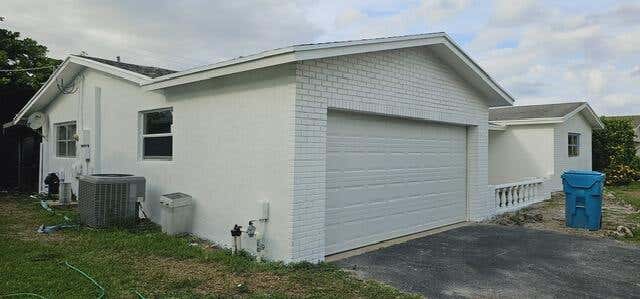 Photo of 1195 SW 27th Place, Boynton Beach, FL 33426 (MLS # R10994446)