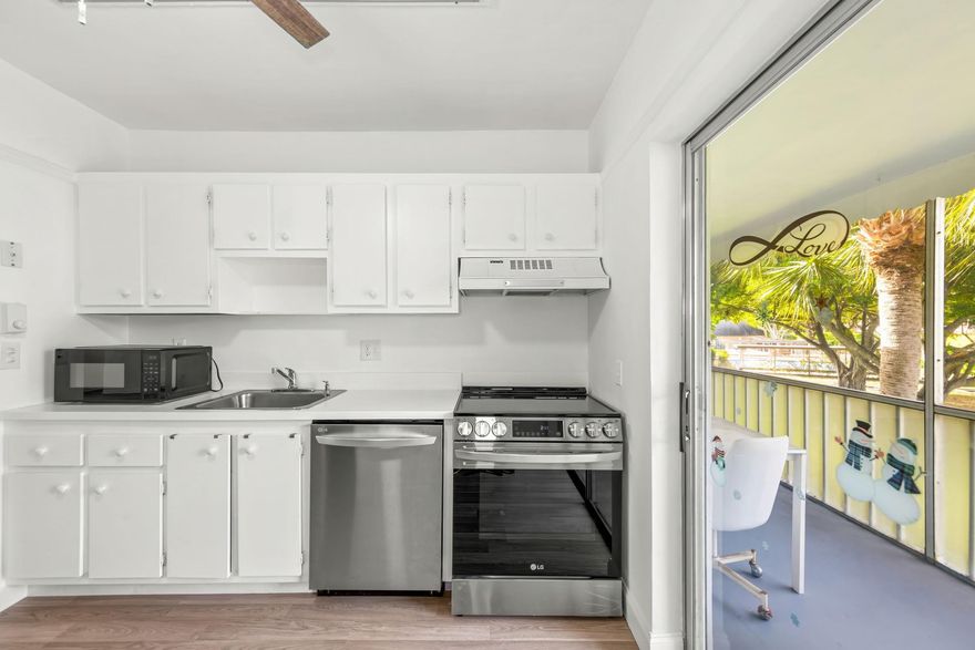 Love where you Live...Oriole Gardens III, Active 55+ Community with Lots of Fun Activities and Planned Events. This unit is just steps away from the Pool and Clubhouse. Freshly Painted, Beautiful New Wood tone Laminate Flooring throughout, Updated Kitchen and Bathrooms. New Light Fixtures, Ceiling Fans. Next door to the Laundry room and Extra-Storage space. Association Fee Includes Basic Cable & Water. Association Requires 700+ CS, POI $40k. 50 yr Inspection complete. NO RENTING and NO ASSESSMENTS (presently) Very Well Managed Community.