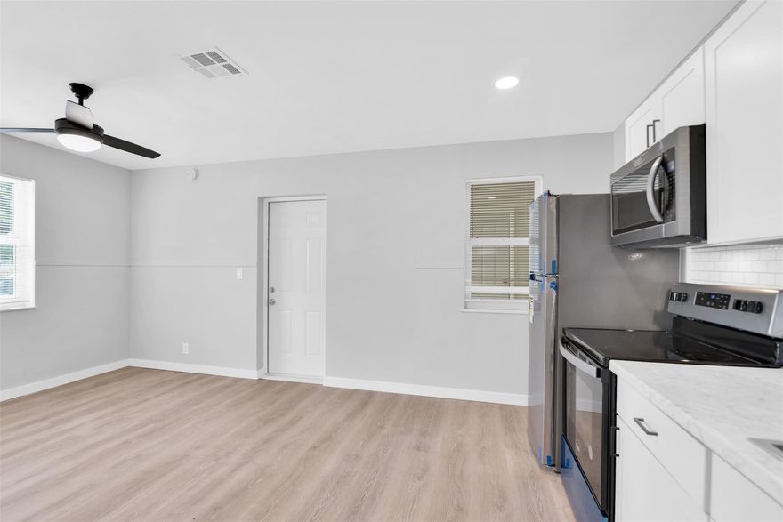 Remodeled 1 bedroom, 1 bath, first floor apartment. Open plan living room-kitchen combination. Park at your door. Small, comfortable 6 unit building with large patio.  CENTRAL AIR. High impact windows.  Stainless steel appliances. Laundry in the building. About a 5 minute walk to the restaurants, bars and coffee shops on Hollywood Blvd.  And, just a 7 minute drive to the BEACH, 2.6 miles away. Ride your bike. Great access to I 95, straight out Hollywood Blvd.  Measurements are approximate and should be verified. All ages welcome.