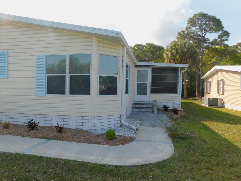 Photo of 206 Sea Conch Place #8, Fort Pierce, FL 34982 (MLS # R11059126)