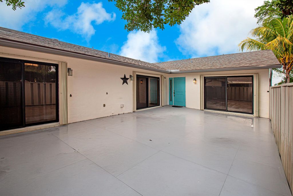 Photo of 8036 Ambach Way, Hypoluxo, FL 33462 (MLS # R11069398)