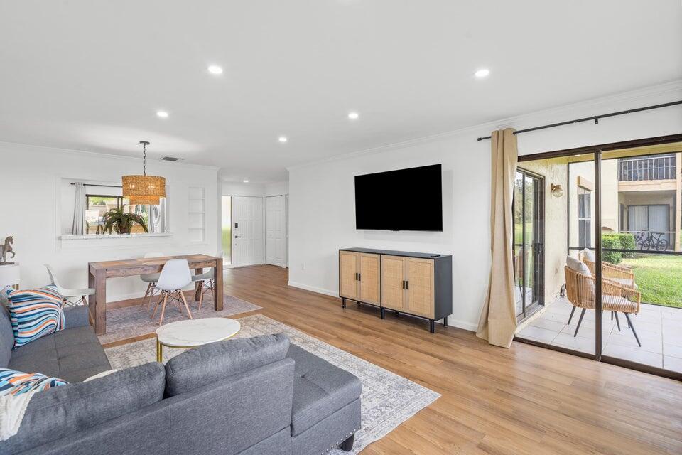 Renovated 2/2 in the Heart of WellingtonThis beautifully renovated 2-bedroom, 2-bathroom home in Wellington features modern finishes throughout. The open-concept living area flows into a gourmet kitchen with brand-new appliances. Enjoy a private, screened back patio overlooking a peaceful canal--perfect for relaxing or entertaining. The spacious master suite includes an ensuite bath, and the home offers ample closet space. Located just minutes from shopping, dining, parks, and top-rated schools. Pet-friendly with an assigned parking space and plenty of guest spots. Washer & dryer in-unit. Schedule a tour​​‌​​​​‌​‌​​​‌‌​​​‌‌‌​​‌​​‌‌​​​​ today!