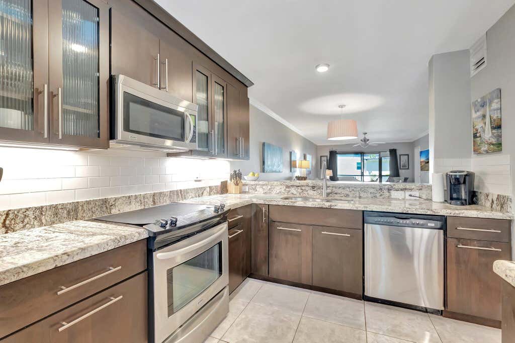 Photo of 701 Avenue L, Delray Beach, FL 33483 (MLS # B26037983)