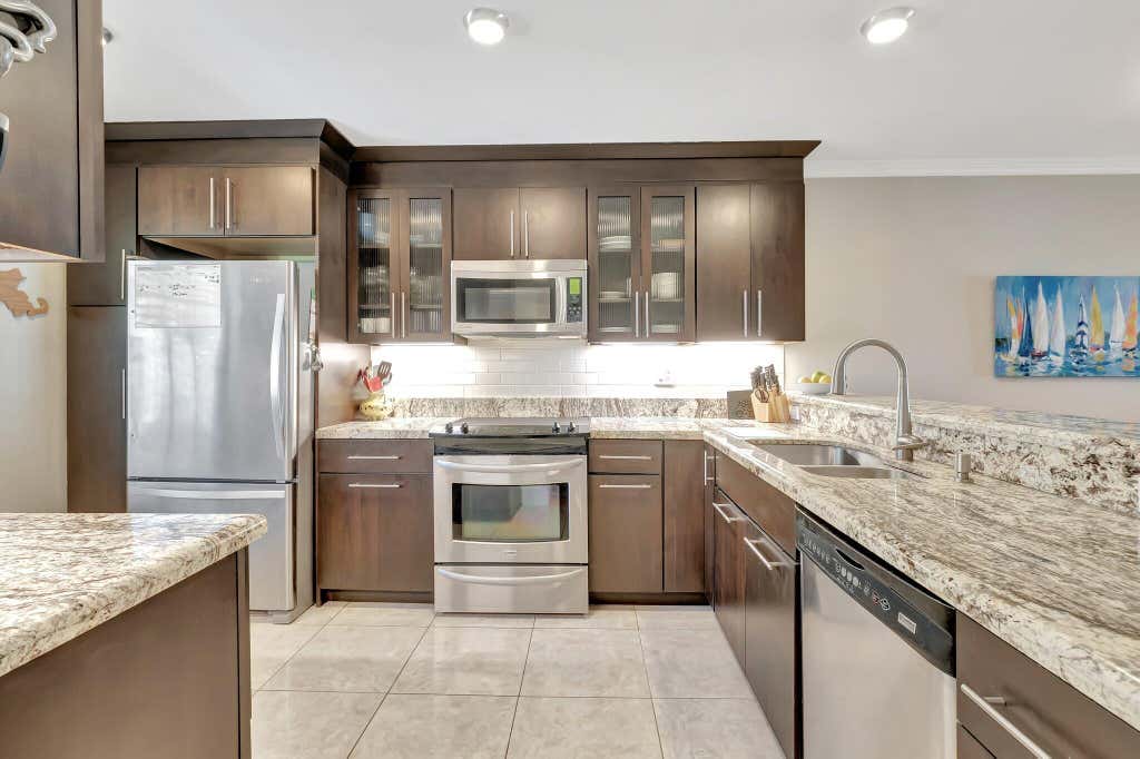 Photo of 701 Avenue L, Delray Beach, FL 33483 (MLS # B26037983)