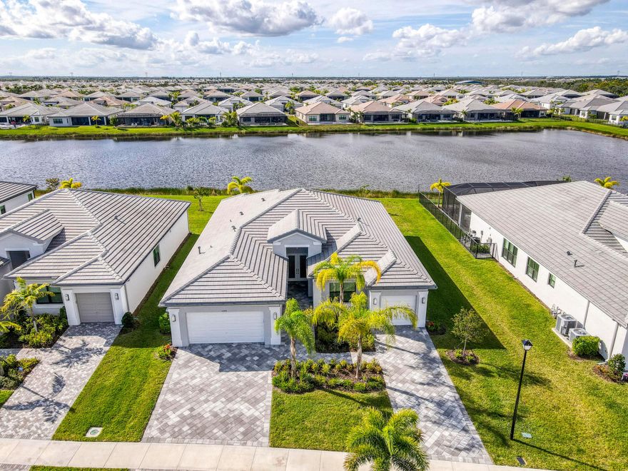 Welcome to this stunning Bellagio model in the prestigious 55+ Valencia Walk at Riverland. Offering 2,668 square feet of thoughtfully designed living space, this exceptional home is being sold fully furnished/turnkey. The open-concept floor plan features soaring ceilings, abundant natural light, and more than $150,000 in builder upgrades throughout. Enjoy one of the community's most desirable and private water views, creating a peaceful backdrop for both everyday living and entertaining. Riverland sets the benchmark for resort-style living, featuring a spectacular 34,000-square-foot clubhouse, state-of-the-art fitness center, resort-style pool, café with indoor and outdoor dining, card rooms, sports lounge, scenic parks, and miles of golf-cart-friendly pathways. Just moments away, the Town Center offers convenient dining options and a Publix for everyday essentials. This is a rare opportunity to enjoy luxury living without the wait of new construction, simply bring your suitcase and begin experiencing the Riverland lifestyle.