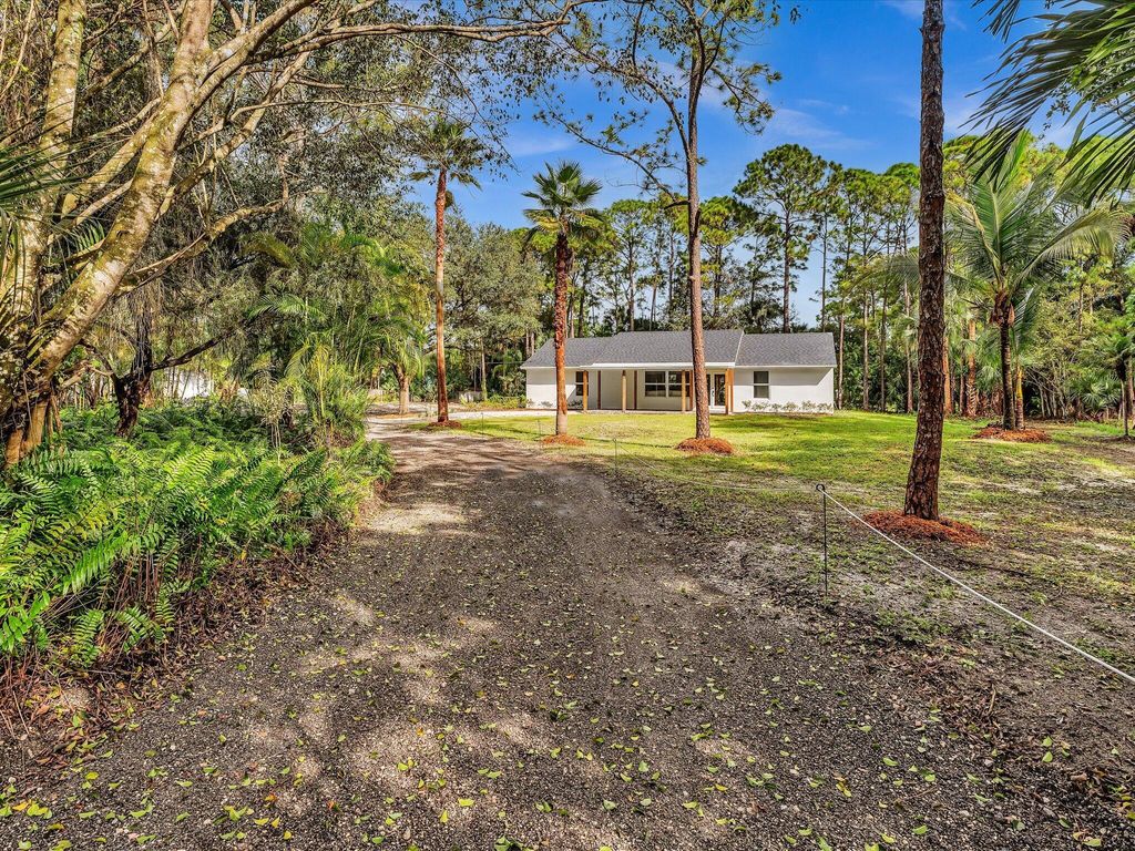 Photo of 15215 76 Rd N, Loxahatchee, FL 33470 (MLS # R11129521)