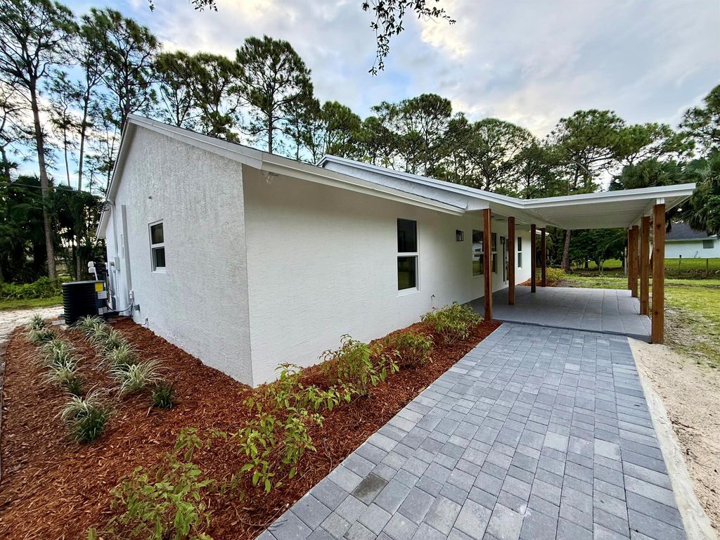 Photo of 15215 76 Rd N, Loxahatchee, FL 33470 (MLS # R11129521)