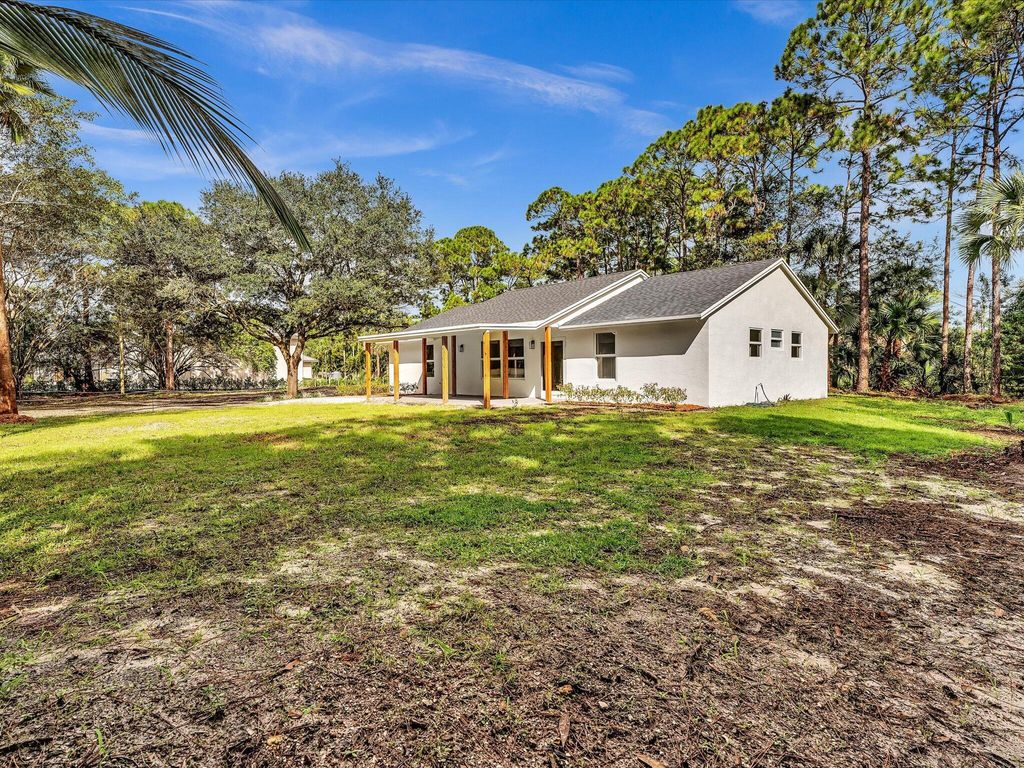 Photo of 15215 76 Rd N, Loxahatchee, FL 33470 (MLS # R11129521)