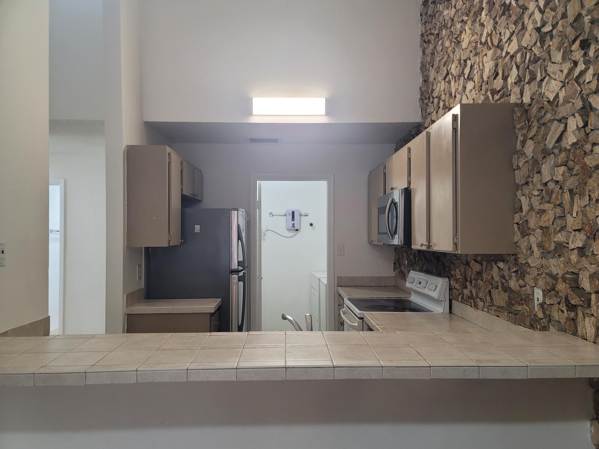 WOODSCAPE TOWNHOMES - Residential Lease