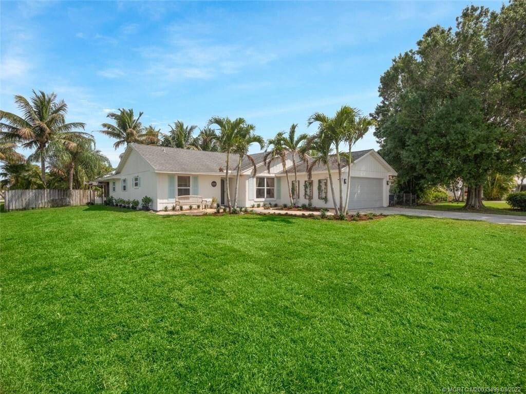 Photo of 1999 NE San Carlos Calle, Jensen Beach, FL 34957 (MLS # R10951415)