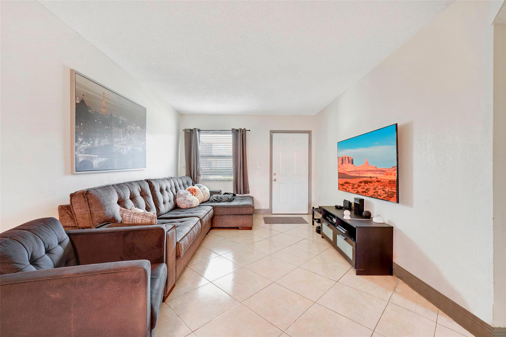 Looking for a great LOCATION? Look no further. West Hialeah rental property! Fantastic LOCATION! Beautiful 1st floor condo, features a spacious living & dining room, updated modern kitchen, 3 bedrooms, 1.5 baths, ceramic tiles, central air, fenced patio for entertaining. 2 parking spots! Highways, parks and shops are minutes away. HURRY as this unit WILL NOT LAST!