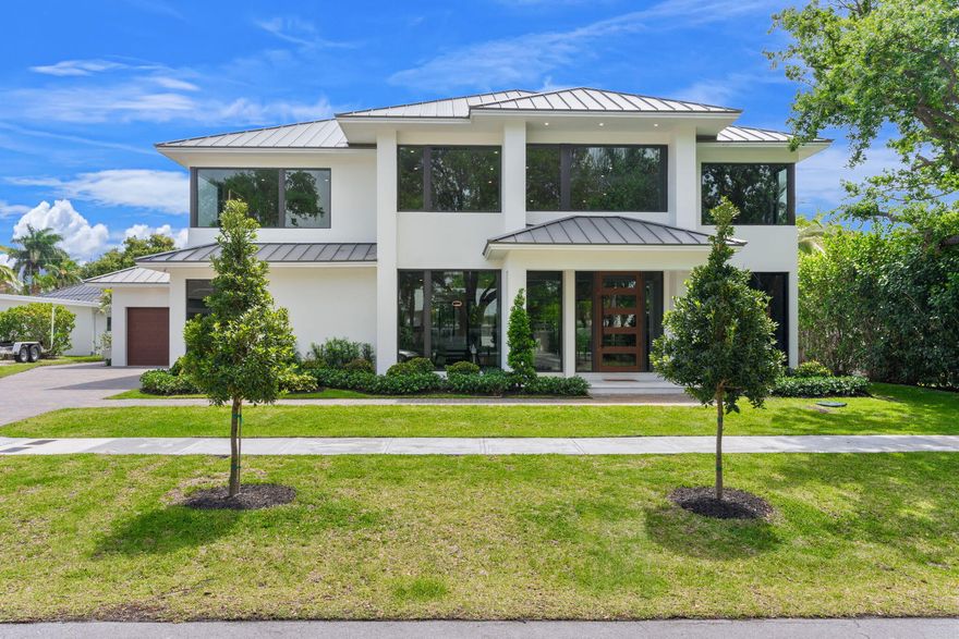 Just Completed Spectacular New-Build By Award Winning Builder & Designer Glenn Wright! Masterful Contemporary Architecture Featuring A Seamless 6225 SqFt Total Of Indoor/Outdoor Living. Floor To Ceiling Windows Create Full Length Views Of Lush FL Tropical Greenery. Sophisticated Open Floor Plan w/5 Beds 6 Baths Plus Office. Cabana Bath Just Off The Pool. A Gorgeous Masterpiece w/22' Tall Great Room. Chef's Custom Kitchen, Thermador Appliances. Monstrous 5-Car Garage + Golf Cart Garage For Car Lovers! Enjoy The 130' Deep Lot That Makes An Expansive Rear Yard From The Outdoor Covered Veranda & Tropical Kitchen For Best Poolside Living. Primary Bedroom Wing Has Two Huge Walk-In Closets & Luxurious Bathroom w/ A Spa-Like Ambiance. Elevator, Smart Home, & Much More!