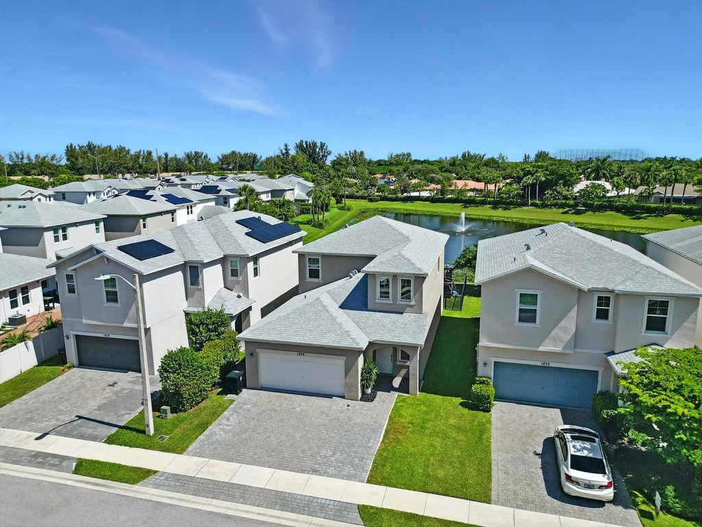 Photo of 1824 Lake Cove Drive, Lake Worth Beach, FL 33460 (MLS # R11114070)